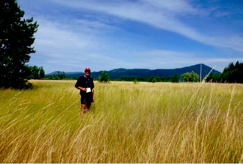 Rick McCharles out standing in his field